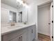 Elegant bathroom featuring a dual sink vanity with quartz countertops and gold faucets at 4201 Hosch Reserve Dr, Buford, GA 30519
