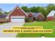 Charming brick home featuring a well-manicured lawn and an attached two-car garage at 1031 Ludwick Way, Lawrenceville, GA 30046