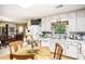 Bright kitchen and cozy breakfast nook at 110 Emerald Dr, Mcdonough, GA 30253