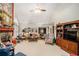 A well decorated living room, featuring a stone fireplace and a vaulted ceiling at 110 Emerald Dr, Mcdonough, GA 30253