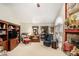 Cozy living room features a stone fireplace, vaulted ceilings, and detailed decor at 110 Emerald Dr, Mcdonough, GA 30253