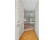 Inviting entryway with wood floors leading to a bright living space at 1220 Paddocks Way, Powder Springs, GA 30127