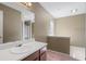 Vanity and shower in main bathroom at 1220 Paddocks Way, Powder Springs, GA 30127