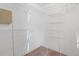 Walk-in closet with metal racks for organization at 1220 Paddocks Way, Powder Springs, GA 30127