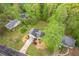 Aerial view of home highlighting landscaping, driveway, and surrounding neighborhood at 128 Partridge Rdg, Woodstock, GA 30188