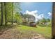 Spacious backyard with two-story deck, ideal for relaxation and entertaining at 128 Partridge Rdg, Woodstock, GA 30188