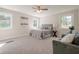 Bright bedroom features large windows, carpet, and modern decor at 128 Partridge Rdg, Woodstock, GA 30188