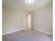 This bedroom has neutral walls, plush carpet, and is move-in ready at 128 Partridge Rdg, Woodstock, GA 30188