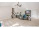 A spacious living room offers vaulted ceilings, a cozy stone fireplace, and neutral flooring at 128 Partridge Rdg, Woodstock, GA 30188