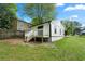 Spacious backyard featuring a deck and lush green lawn, perfect for outdoor gatherings at 1917 Connally Dr, Atlanta, GA 30344