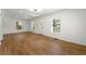 Spacious living room with hardwood floors and natural light from multiple windows at 1917 Connally Dr, Atlanta, GA 30344