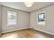 Bedroom featuring hardwood floors, base trim and windows at 3137 Ardley Sw Rd, Atlanta, GA 30311