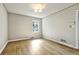 Bedroom featuring hardwood floors, neutral walls, and a window for natural light at 3137 Ardley Sw Rd, Atlanta, GA 30311