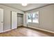 Bedroom featuring hardwood floors, neutral walls, and a closet at 3137 Ardley Sw Rd, Atlanta, GA 30311