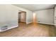 Spacious living area boasting gleaming hardwood floors and seamless flow to other parts of the home at 3137 Ardley Sw Rd, Atlanta, GA 30311