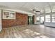 Spacious sunroom with brick wall accent, sliding glass doors, and lots of natural light at 3137 Ardley Sw Rd, Atlanta, GA 30311