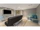 Finished basement featuring neutral paint, tile floors, custom built in cabinets and seating at 4220 Club Ne Dr, Atlanta, GA 30319