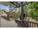 Deck with multiple seating areas, gas grill, lush landscaping and view of the backyard at 4220 Club Ne Dr, Atlanta, GA 30319