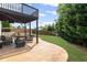 Relaxing backyard patio with outdoor seating and a lush lawn, perfect for entertaining guests at 1268 Windsor Glen Dr, Douglasville, GA 30134