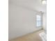 Small bedroom with carpet and one window allowing ample sunlight at 1268 Windsor Glen Dr, Douglasville, GA 30134