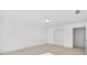 Simple bedroom with carpet, a ceiling light, and closet storage at 1268 Windsor Glen Dr, Douglasville, GA 30134