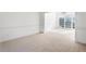 Spacious dining room with ample natural light from large windows at 1268 Windsor Glen Dr, Douglasville, GA 30134