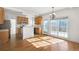 Well-lit kitchen with stainless steel appliances, light wood cabinets, and a view to the deck at 1268 Windsor Glen Dr, Douglasville, GA 30134