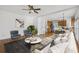 Comfortable living area open to the kitchen, featuring hardwood floors and natural light at 1268 Windsor Glen Dr, Douglasville, GA 30134