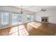 Sun-drenched living space with fireplace and hardwood floors at 1268 Windsor Glen Dr, Douglasville, GA 30134