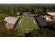 Aerial view of a football stadium surrounded by lush green trees at 2852 Evanshire Ave # 114, Duluth, GA 30096