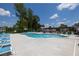 A luxurious community pool with plenty of seating, perfect for relaxing and enjoying the outdoors at 2852 Evanshire Ave # 114, Duluth, GA 30096