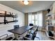 Modern office space with a long wood table, black chairs, shiplap walls, and a window at 2852 Evanshire Ave # 114, Duluth, GA 30096
