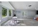 Bright finished basement with large windows, walk-out doors, playroom, and recessed lighting at 660 Willow Knoll Se Dr, Marietta, GA 30067