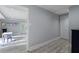 Finished basement with luxury vinyl flooring, playroom with chalk board, and walk out access at 660 Willow Knoll Se Dr, Marietta, GA 30067