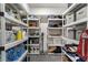 Walk-in pantry features multiple shelves with ample storage space at 660 Willow Knoll Se Dr, Marietta, GA 30067