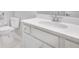 Bathroom featuring a single sink vanity with drawers and a toilet beside at 108 Aj Welch Jr Way, Mcdonough, GA 30252