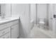 Bathroom with vanity, single sink and view of the toilet and shower/bath combo at 108 Aj Welch Jr Way, Mcdonough, GA 30252