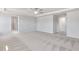 Large bedroom with plush carpeting and a ceiling fan with doorway leading to other rooms at 108 Aj Welch Jr Way, Mcdonough, GA 30252