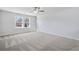 Expansive bedroom with plush carpeting and natural light at 108 Aj Welch Jr Way, Mcdonough, GA 30252