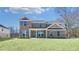 Inviting two-story brick home with manicured lawn and charming front porch at 108 Aj Welch Jr Way, Mcdonough, GA 30252