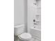 Bathroom features a white toilet and a white shower/tub combo with a shower head at 124 Aj Welch Jr Way, Mcdonough, GA 30252