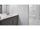 Elegant bathroom with modern vanity, sleek fixtures, and a bathtub/shower combination at 124 Aj Welch Jr Way, Mcdonough, GA 30252
