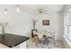Cozy dining area with a vintage table, classic chairs, and white wainscoting at 1248 Conway Rd, Decatur, GA 30030