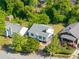 Aerial view of the houses showcasing mature trees, and cozy neighborhood at 1575 Linda Sw Way, Atlanta, GA 30310