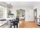 Open dining area with hardwood floors, stylish furnishings and lots of natural light at 1575 Linda Sw Way, Atlanta, GA 30310