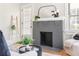 Charming fireplace with black and gray tile, ladder, and plants at 1575 Linda Sw Way, Atlanta, GA 30310