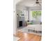 Bright living room with fireplace, hardwood floors, and stylish furniture at 1575 Linda Sw Way, Atlanta, GA 30310
