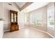 Inviting dining area with a large window and stylish lighting fixture at 1284 Charter Club Ct, Lawrenceville, GA 30043