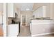 Kitchen featuring bright cabinets, granite countertops, and stainless steel appliances at 1284 Charter Club Ct, Lawrenceville, GA 30043