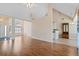 Bright, open-concept living room featuring hardwood floors and ample natural light at 1284 Charter Club Ct, Lawrenceville, GA 30043